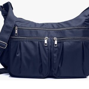 Crossbody bag with outside pockets